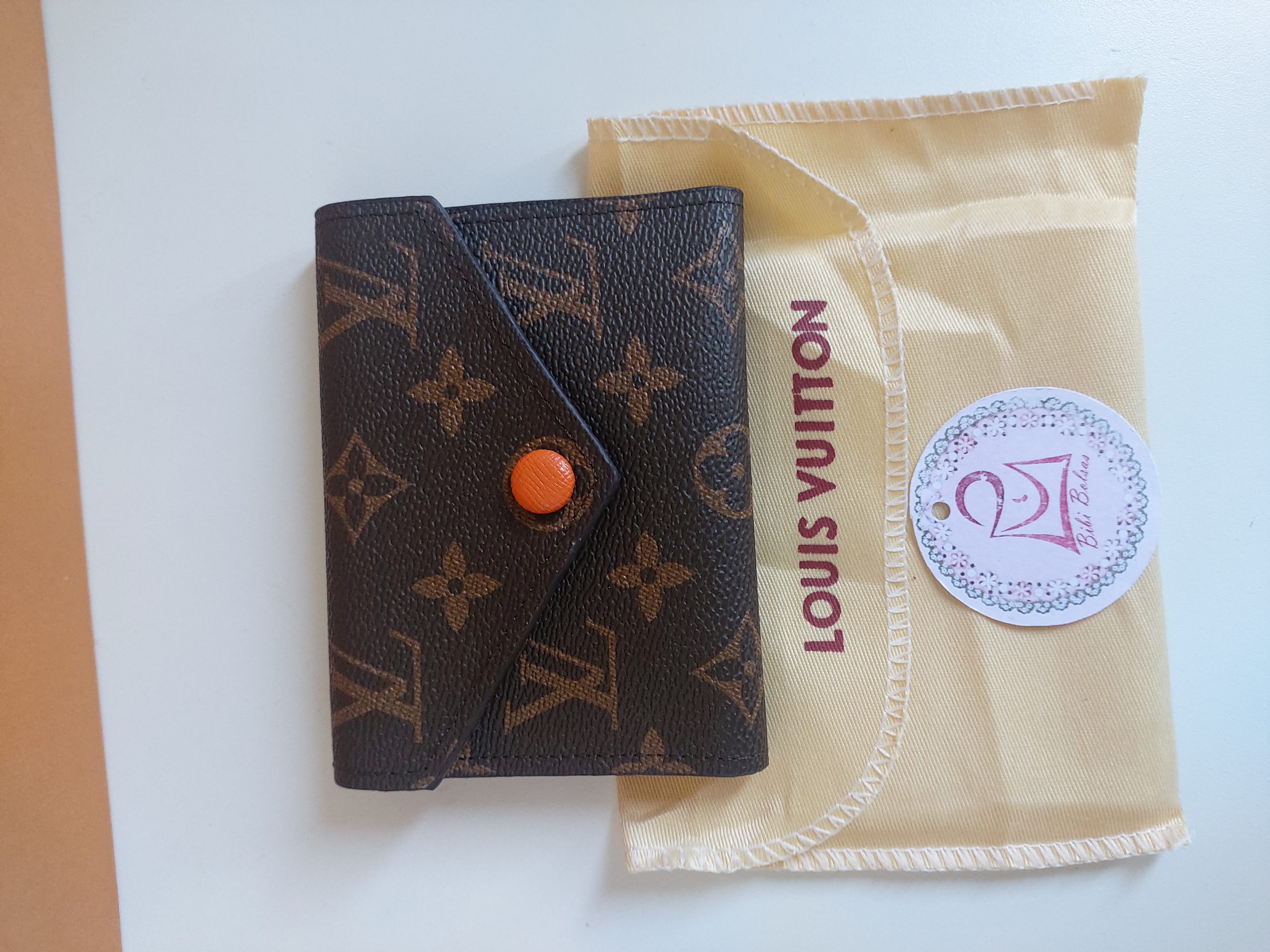 Mini carteira em couro LV